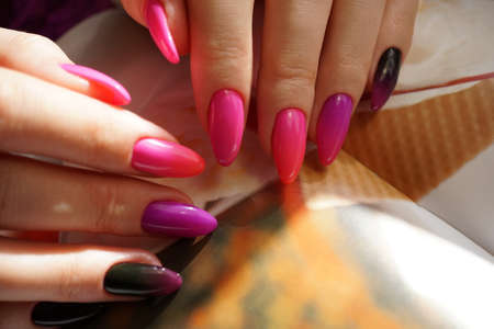 Awesome nails and beautiful clean manicure. Nails are natural. Manicure is made using nails drill machine.の写真素材