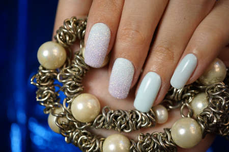 Awesome nails and beautiful clean manicure. Nails are natural. Manicure is made using nails drill machine.の写真素材