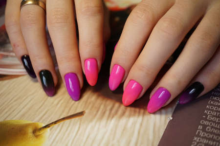 Awesome nails and beautiful clean manicure. Nails are natural. Manicure is made using nails drill machine.の写真素材