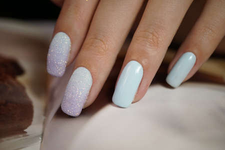 Awesome nails and beautiful clean manicure. Nails are natural. Manicure is made using nails drill machine.の写真素材