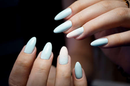 Awesome nails and beautiful clean manicure. Nails are natural. Manicure is made using nails drill machine.の写真素材