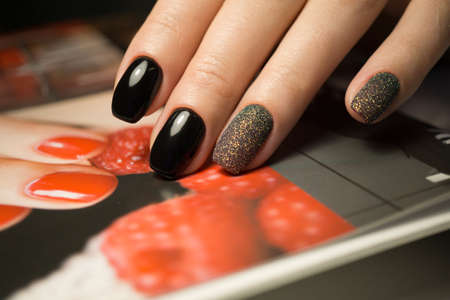 The beauty of the natural nails. Perfect clean manicure for the bright people. Nail drill machine and cuticle nipper are used simultaneously to make such a clean manicure.の写真素材