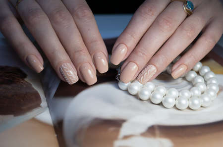 Natural nails, gel polish. Perfect clean manicure with zero cuticle. Nail art design for the fashion style.の写真素材