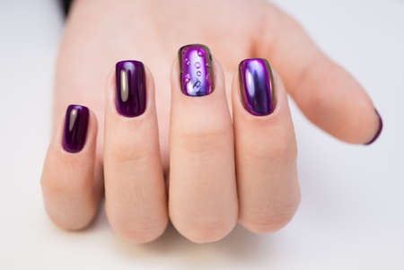 Natural nails, gel polish. Perfect clean manicure with zero cuticle. Nail art design for the fashion style.の写真素材