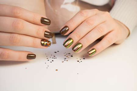 Natural nails, gel polish. Perfect clean manicure with zero cuticle. Nail art design for the fashion style.の写真素材