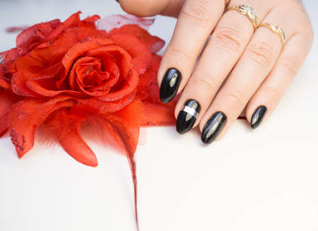 Perfect manicure and natural nails. Attractive modern nail art design. Gel polish applied.の写真素材