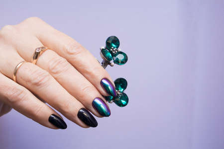 Perfect manicure and natural nails. Attractive modern nail art design. Gel polish applied.の写真素材