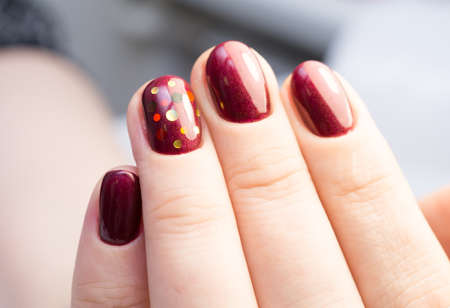 Perfect manicure and natural nails. Attractive modern nail art design. Gel polish applied.の写真素材