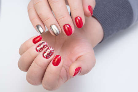 Amazing manicure and natural nails with gel polish. Attractive modern nail art design.
