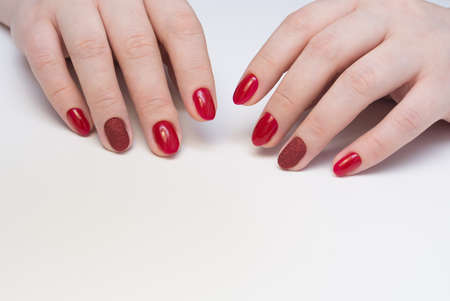Amazing manicure and natural nails with gel polish. Attractive modern nail art design.