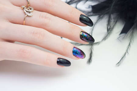 Beautiful hands and natural nails, ideal clean manicure. Decorated with stylish elementsの写真素材