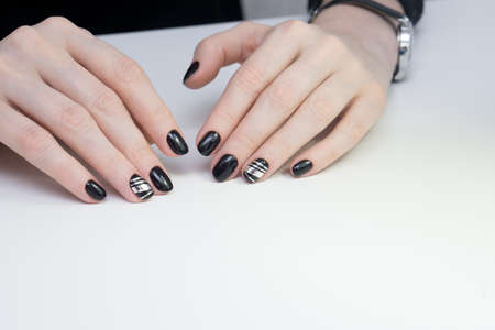 Beautiful woman's hands. Natural nails and manicure. Spa procedure.の写真素材