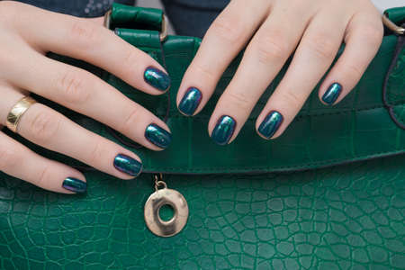 Beautiful woman's hands. Natural nails and manicure. Spa procedure.の写真素材