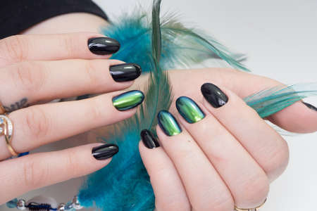 Beautiful woman's hands. Natural nails and manicure. Spa procedure.の写真素材