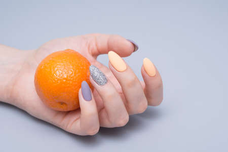 Beautiful hands with stylish manicure. Women have natural nails.の写真素材