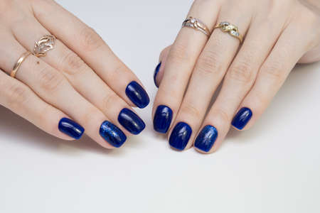 Beautiful woman's hands. Natural nails and manicure. Spa procedure.の写真素材