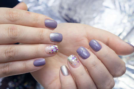 Beautiful woman's hands. Natural nails and manicure. Spa procedure.の写真素材