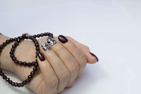 Beautiful hands with stylish manicure. Women have natural nails.の写真素材