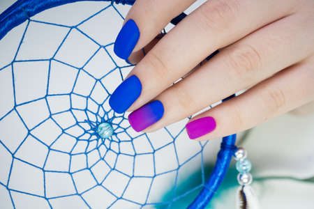 Beautiful hands with stylish manicure. Women have natural nails.の写真素材