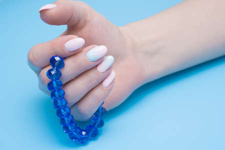 Natural nails and amazing clean manicure. Gel polish applied.の写真素材