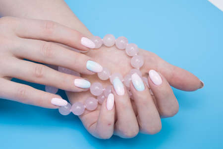 Natural nails and amazing clean manicure. Gel polish applied.の写真素材
