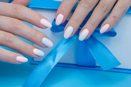 Natural nails and amazing clean manicure. Gel polish applied.の写真素材