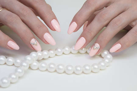 Natural nails and amazing clean manicure. Gel polish applied.の写真素材