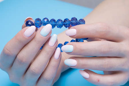 Natural nails and amazing clean manicure. Gel polish applied.の写真素材