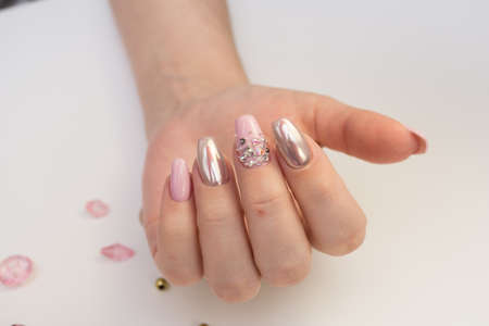Attractive women's hands. Natural nails with beautiful manicure.の写真素材