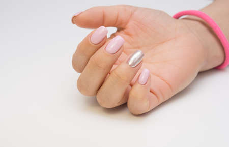 Attractive women's hands. Natural nails with beautiful manicure.の写真素材