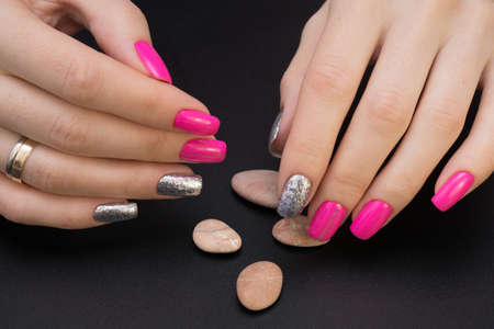 Attractive women's hands. Natural nails with beautiful manicure.の写真素材