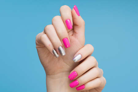 Attractive women's hands. Natural nails with beautiful manicure.の写真素材