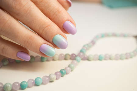 Attractive women's hands. Natural nails with beautiful manicure.の写真素材