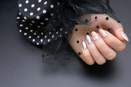 Hands with beautiful manicure. Natural nails with gel polishの写真素材