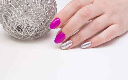 Beautiful manicure and nail art. Natural nails and gel polish.の写真素材