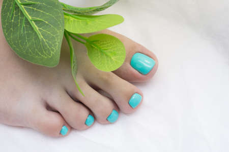 Women's foot and clean pedicure, natural nails. Gel polish applied.の写真素材