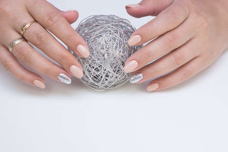 Amazing natural nails. Women's hands with clean manicure. Gel polish applied.の写真素材