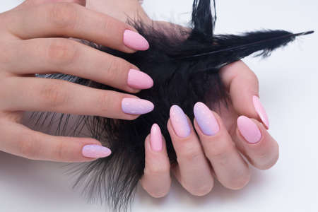 Amazing natural nails. Women's hands with clean manicure. Gel polish applied.の写真素材