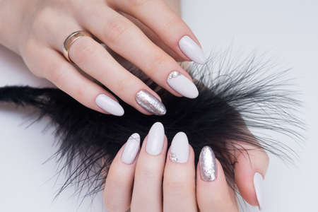 Amazing natural nails. Women's hands with clean manicure. Gel polish applied.の写真素材