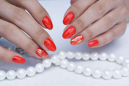 Amazing natural nails. Women's hands with clean manicure. Gel polish applied.の写真素材