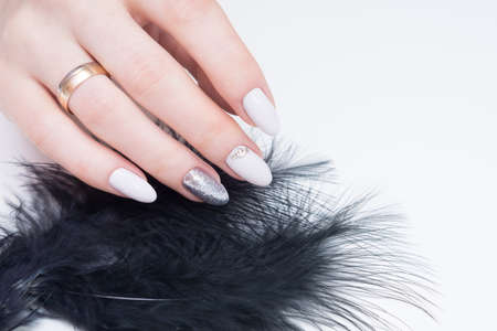 Amazing natural nails. Women's hands with clean manicure. Gel polish applied.の写真素材