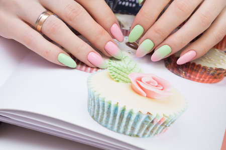 Natural nails with gel polish applied. Ideal manicure and women's hands.の写真素材
