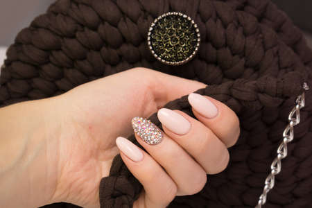 Beautiful natural nails and attractive manicure on women hands.の写真素材