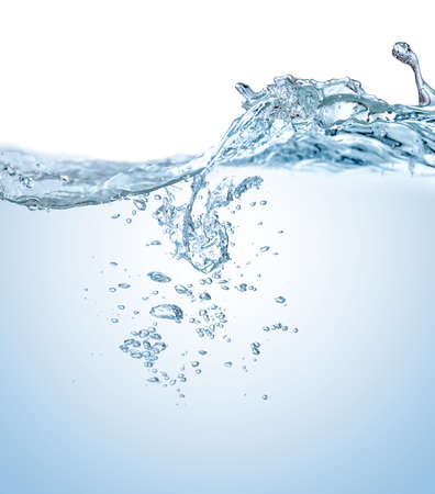 Water splashes with bubbles and waves on the blue background.の写真素材