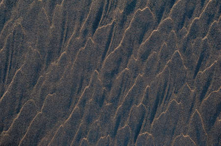 Black sand waves as background