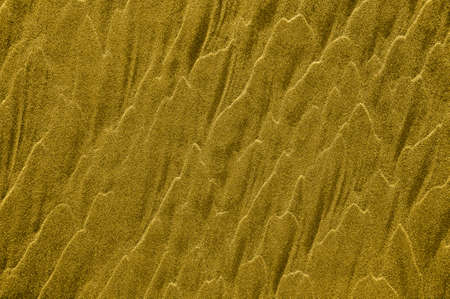 Golden sand waves as background
