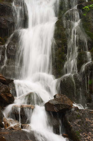 Waterfall in the mountains. Fresh motion shot of the riverの写真素材