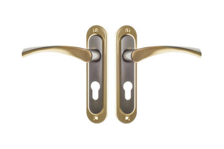 Silver and golden modern door handle with floral ornament. Flat lay object isolated on white background.の写真素材