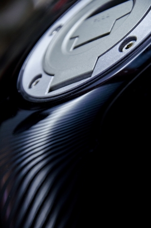 Motorcycle gas tank with light reflexの写真素材