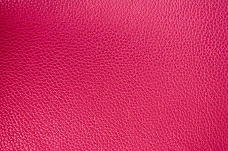 Leather texture. Pink fashionable background. Stylish wallpaper. Rough surface.の写真素材